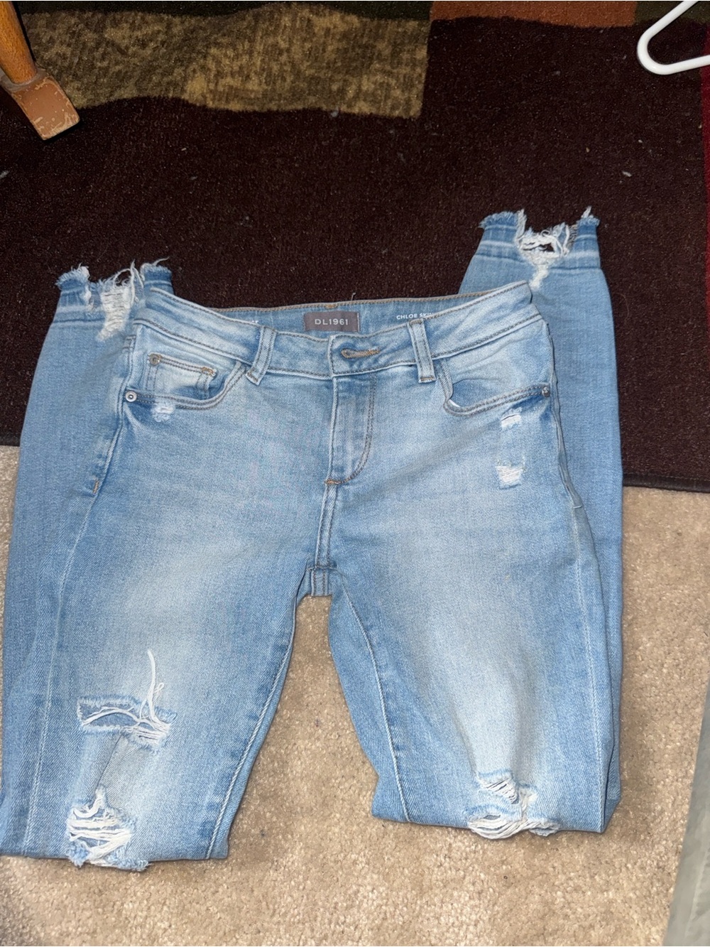 DL1961 Distressed Light Blue Skinny Jeans